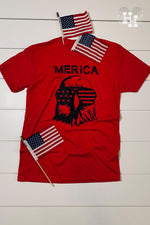 Flat Lay of red tshirt with a black logo on it. The black logo is a bald eagle head wearing sunglasses with the word Merica above it. 
