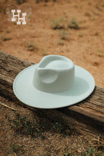 Light mint green wide brim hat. 